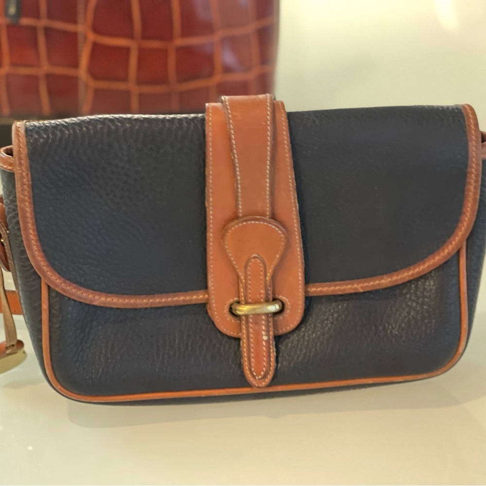 Dooney & Bourke (artesian leather) purse.